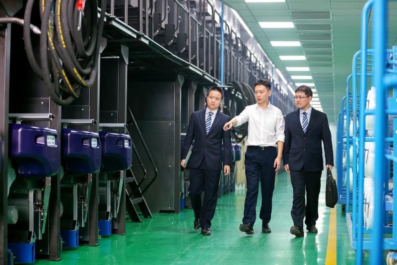 邮储银行汕头市分行客户经理到纺织企业开展调研(吴舒仪 摄)
